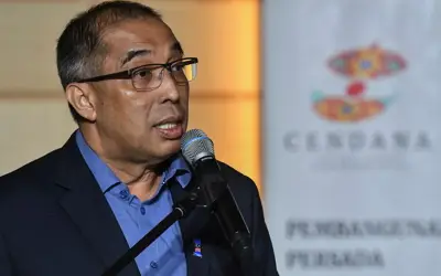 Bekas MB Sabah gesa Umno terima peranan lebih kecil