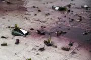 Lelaki 23 tahun ditahan selepas baling botol wain dari flat HDB Woodlands