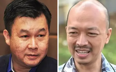 See-To dan Ketua J-Kom Saling Cabar dan Saman