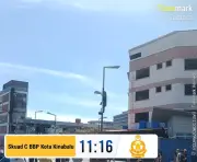 Anggota Bomba Selamatkan Lelaki Terperangkap di Tiang Lampu Jalan di Kota Kinabalu