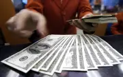 Dolar AS dijangka catat bulan terbaik dalam hampir setahun