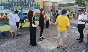 EC nafi larang pemakai seluar pendek di pusat mengundi