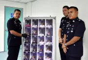 Polis Malaysia bust sindiket pelaburan palsu, tangkap 21 warga China di Melaka